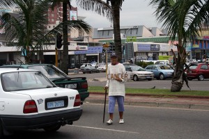 A begger in South Africa. John Charalambous via Flickr.